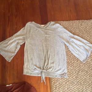 Grey/black blouse with bell sleeves and tie